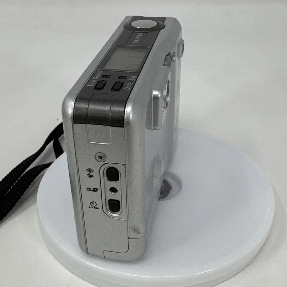 CANON Elph Jr. APS Film Camera, 26mm‎ f2.8 Wide Angle Lens, Silver w/ Case WORKS